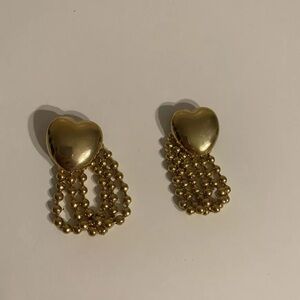 Gold hearted costume earrings.